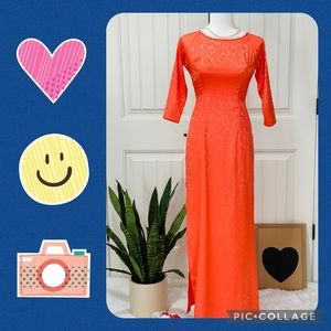 Orange Vietnamese traditional dress